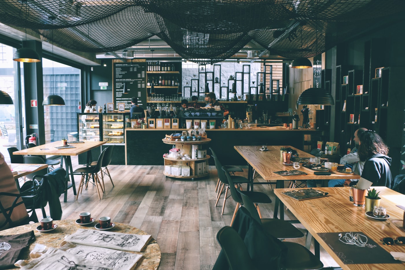 A cosy cafe filled with plants